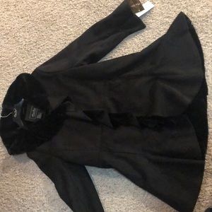 This is a very soft faux fur coat.